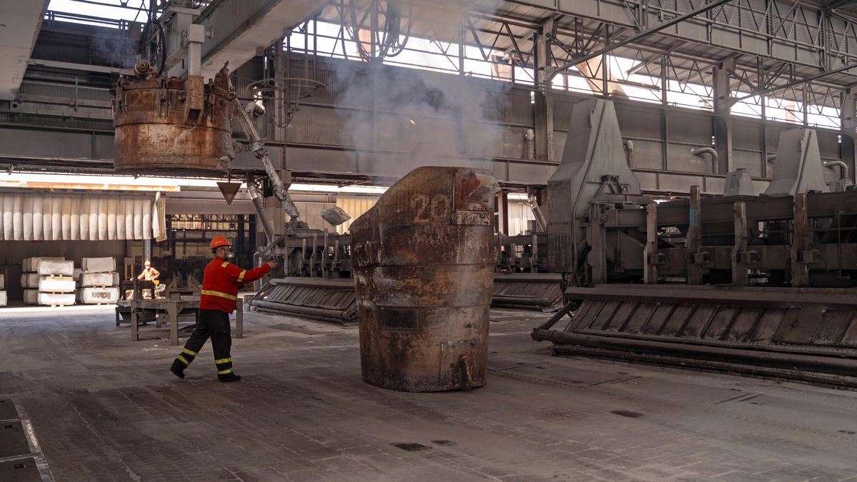 A worker at the Aluminum of Greece plant, a unit of Metlen Group, in Agios Nikolaos, Viotia, Greece, on Tuesday, April 1, 2025. President Donald Trump said he would be imposing both broad reciprocal tariffs and additional sector-specific tariffs on April 2. Photographer: Nick Paleologos/Bloomberg via Getty Images