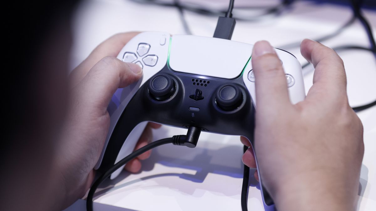 An attendee uses a controller while playing the Final Fantasy VII Rebirth video game on a Sony Group Corp. PlayStation 5 (PS5) Pro video game console at the Tokyo Game Show in Chiba, Japan, on Thursday, Sept. 26, 2024. The show runs through to Sept. 29. Photographer: Kiyoshi Ota/Bloomberg via Getty Images