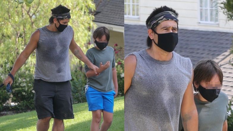 Colin Farrell i Henry Tadeusz na spacerze