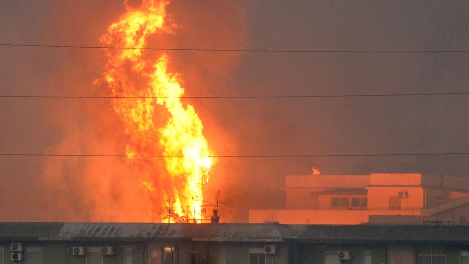 Temporary
This photo obtained from Italian news agency Ansa shows a vast fire spreading on hills in the area of Monte Grifone and the town of Ciaculli around Palermo, Sicily, on July 25, 2023, with flames threatening nearby houses. Sicilian firefighters were fighting overnight against several fires, one of which neared Palermo airport, forcing it to close for several hours in the morning. (Photo by STRINGER / ANSA / AFP) / Italy OUT
STRINGER