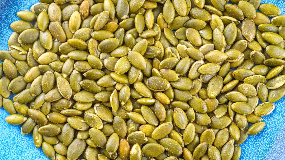 CANADA - 2024/10/07: In this photo illustration, , a close-up of roasted pumpkin seeds with salt. (Photo Illustration by Roberto Machado Noa/LightRocket via Getty Images)