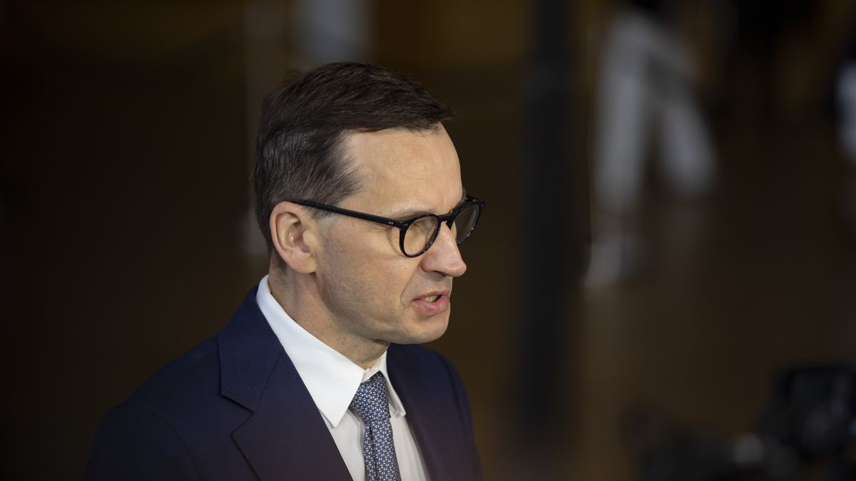 Mateusz Morawiecki Prime Minister of Poland arrives at the extraordinary special EU summit about Ukraine, Energy and Defense, walking next to the European flags and speaks to the press. Meeting of the EU leaders, the European Council in Brussels, Belgium on May 31, 2022 (Photo by Nicolas Economou/NurPhoto via Getty Images)