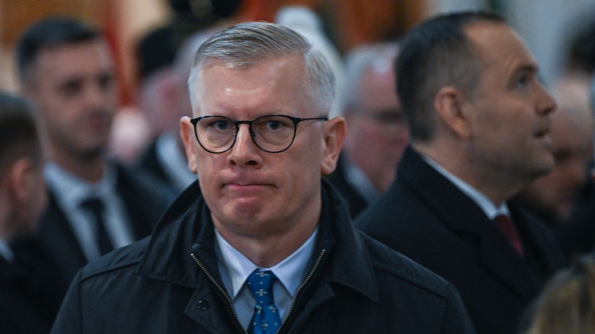 KATOWICE, POLAND  DECEMBER 16:Slawomir Cenckiewicz (L), Head of the National Security Bureau, attends a Mass at the Church of the Elevation of the Holy Cross during ceremonies commemorating the 44th anniversary of the 1981 pacification of the 'Wujek coal mine,' in Katowice, Silesian Voivodeship, Poland, on December 16, 2025.In December 1981, during the introduction of martial law in communist Poland, security forces opened fire on striking miners at the 'Wujek' mine, killing nine workers and injuring many others. (Photo by Artur Widak/NurPhoto via Getty Images)