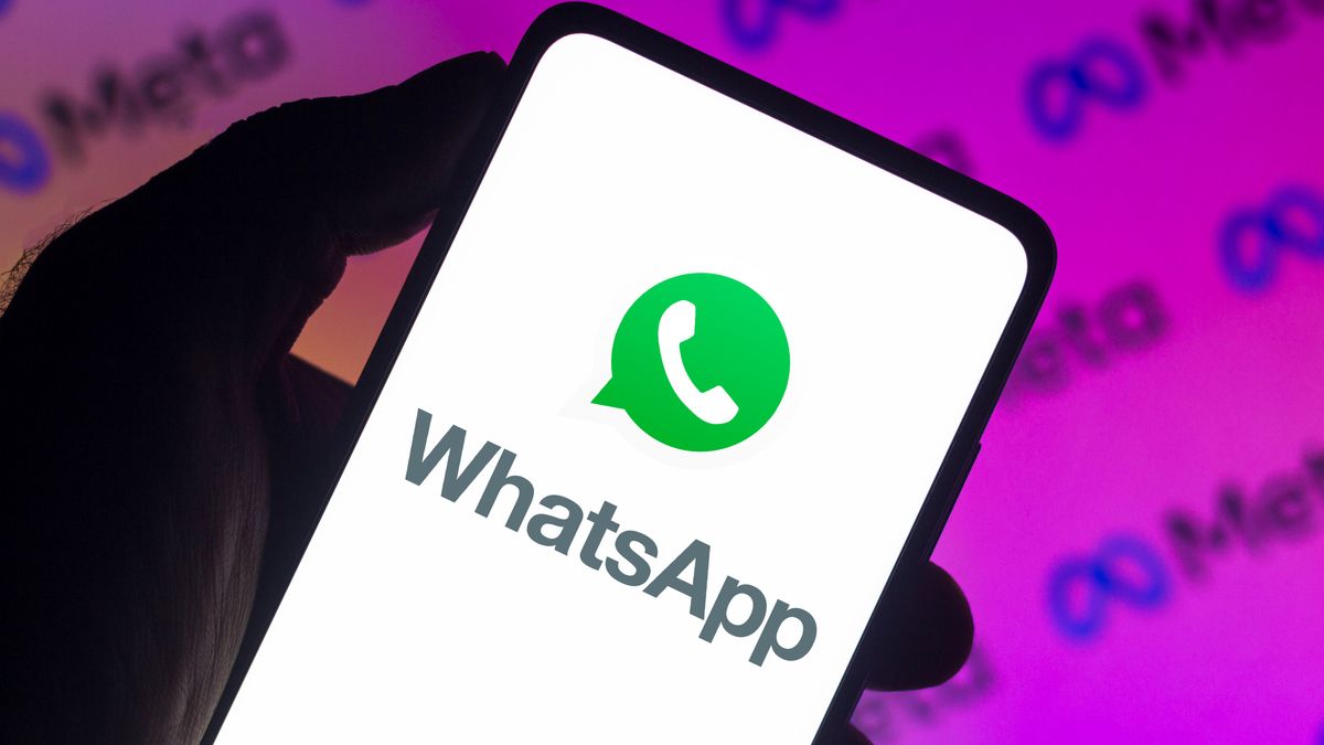 BRAZIL - 2021/12/13: In this photo illustration a WhatsApp logo seen displayed on a smartphone with a Meta Platforms logo in the background. (Photo Illustration by Rafael Henrique/SOPA Images/LightRocket via Getty Images)