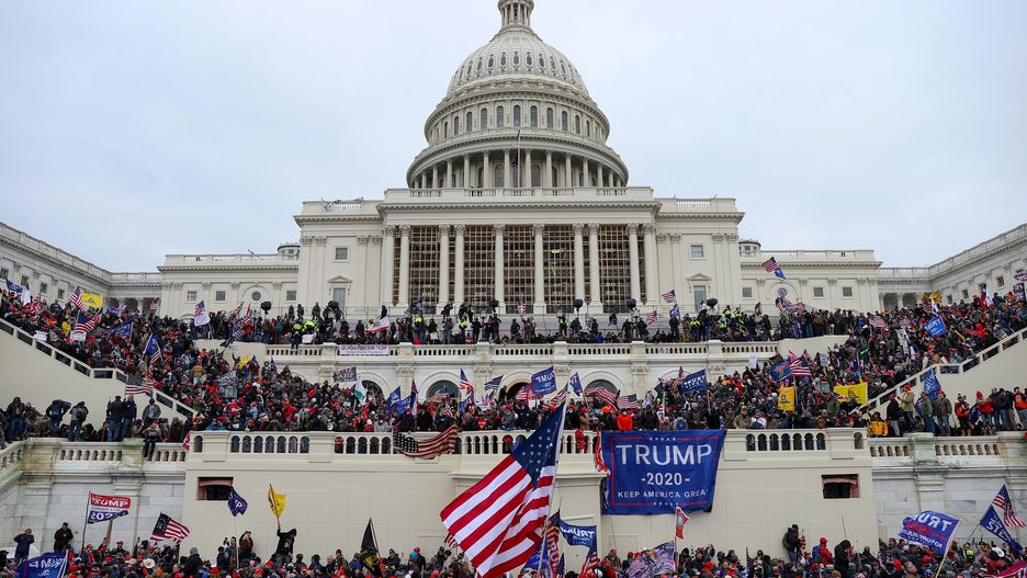 WASHINGTON D.C., USA - JANUARY 6: US President Donald Trumps supporters gather outside the Capitol building in Washington D.C., United States on January 06, 2021. Pro-Trump rioters stormed the US Capitol as lawmakers were set to sign off Wednesday on President-elect Joe Biden's electoral victory in what was supposed to be a routine process headed to Inauguration Day. (Photo by Tayfun Coskun/Anadolu Agency via Getty Images)