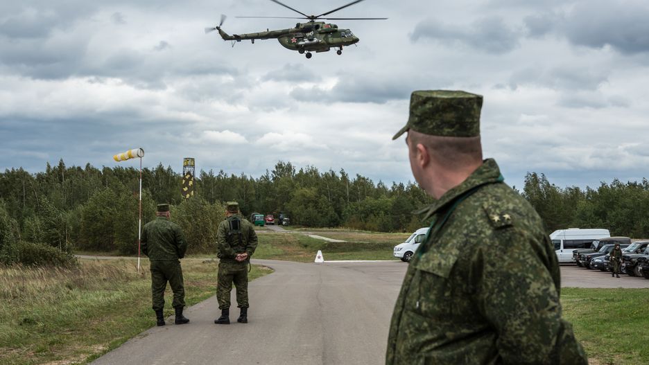 Zapad Joint Military Exercises Between Russia And Belarus
ASIPOVICHY, BELARUS - SEPTEMBER 18: Belarusian soldiers watching the Zapad 2017 military exercises at the Asipovichy military training ground on September 18, 2017 in in Asipovichy, Belarus. The joint military exercises between Belarus and Russia, last held four years ago, have raised alarm in the NATO-member countries to the west over concerns that as many as 100,000 troops may take part, well above the declared 12,700, and that it will serve as cover for Russia to move a permanent contingent of soldiers to Belarus or potentially launch incursions into neighboring countries. (Photo by Brendan Hoffman/Getty Images)
Brendan Hoffman