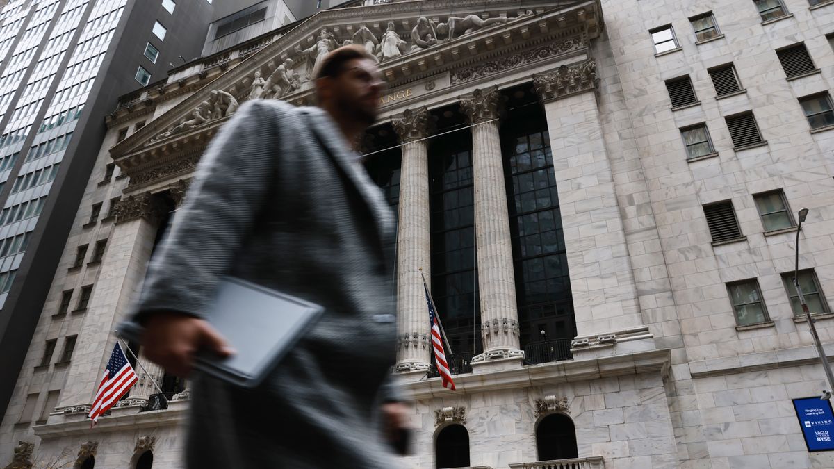 NEW YORK, NEW YORK - NOVEMBER 20: People walk past the  New York Stock Exchange (NYSE) on November 20, 2025 in New York City. Stocks surged over 500 points after Nvidia on Wednesday reported fiscal third-quarter earnings that beat expectations.  (Photo by Spencer Platt/Getty Images)