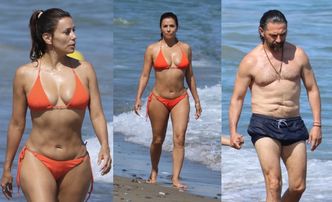 Eva Longoria w pomarańczowym bikini eksponuje talię klepsydry, uskuteczniając "plażing" z mężem (ZDJĘCIA)