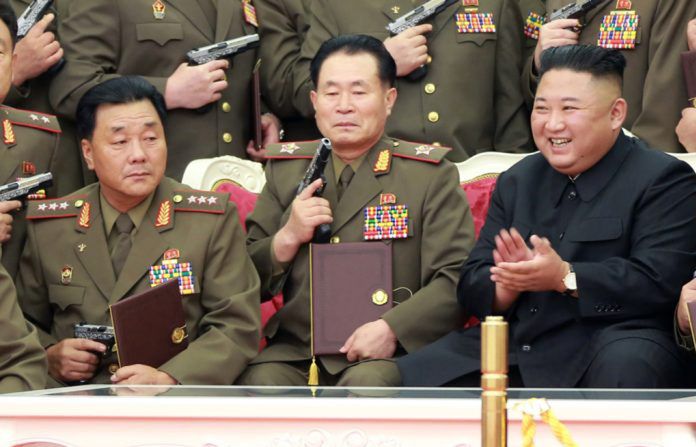 Gen. Kim Dzong Bok in the photo, right next to the leader of the regime