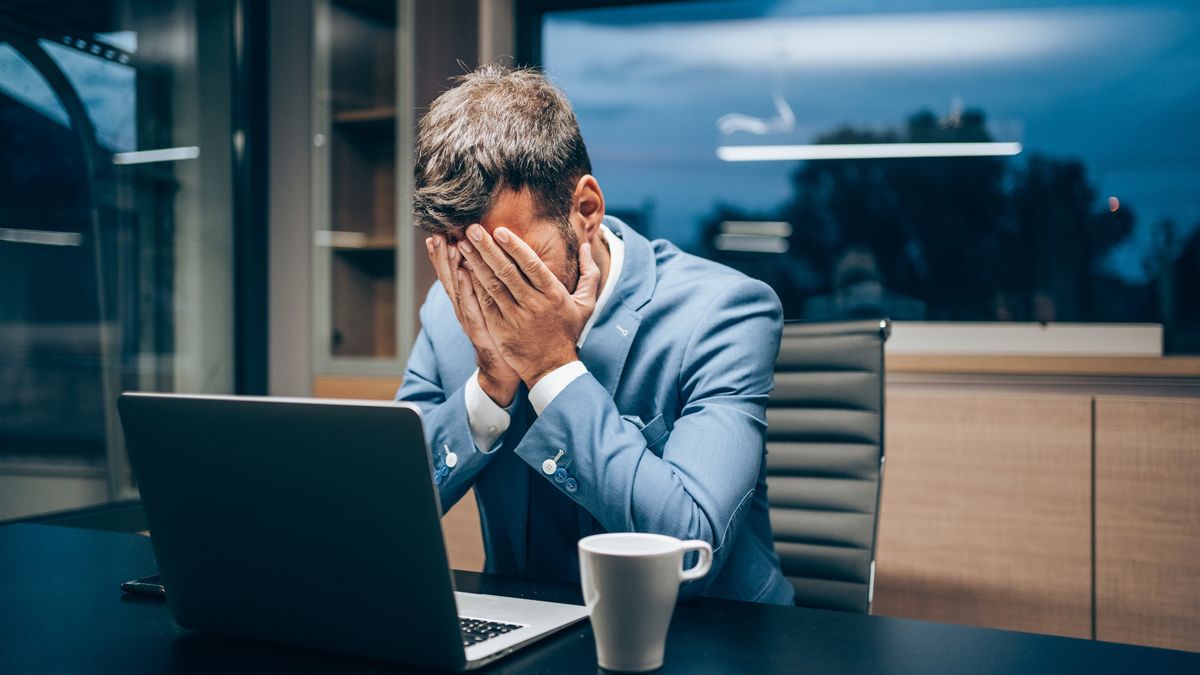 Businessman working late in the office.
Shot of stressed businessman working with laptop at office during night. Exhausted businessman having a headache in modern office. Tired man working late in his office. Overworked businessman staying late hours in the office and using laptop.
VioletaStoimenova