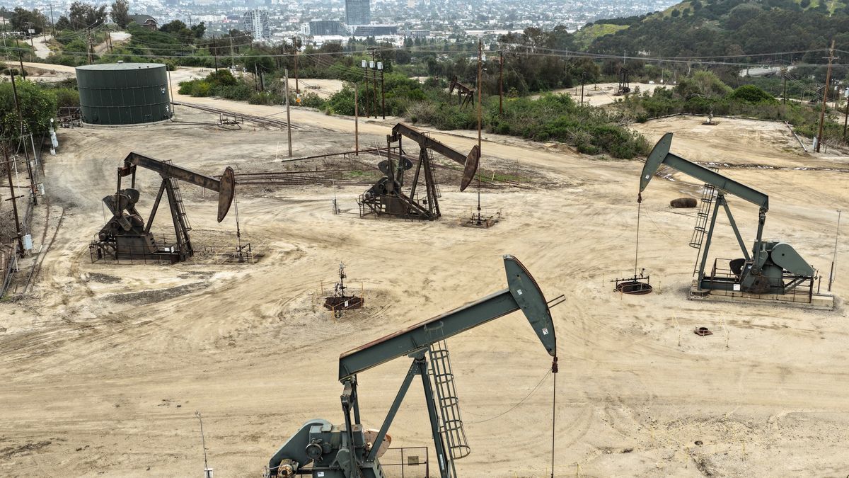 LOS ANGELES, CALIFORNIA - MARCH 10: An aerial view as oil pumpjacks operate while others stand idle in the Inglewood Oil Field on March 10, 2026 near Los Angeles, California. A barrel of oil passed the $100 mark yesterday amid the war in Iran for the first time since the Russian invasion of Ukraine in 2022. (Photo by Mario Tama/Getty Images)
