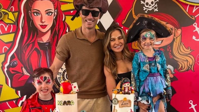 Anna i Robert Lewandowscy z córkami