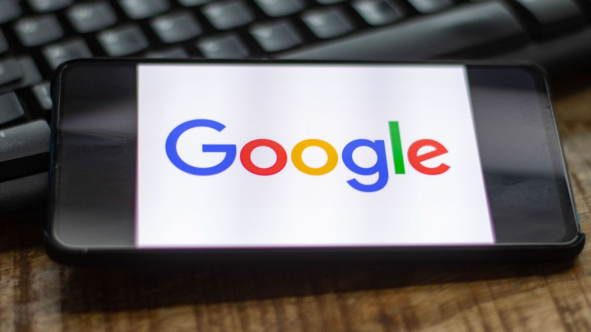 Google closeup logo displayed on a phone screen, smartphone on a keyboard is seen in this multiple exposure illustration, the company's symbol is globally recognized. Google, LLC is an American tech giant, a multinational technology company that specializes in Internet-related services and products, which include online advertising technologies, a search engine, cloud computing, software, and hardware. It is considered one of the Big Four technology companies in the U.S. . Amsterdam, the Netherlands on October 22, 2020 (Photo by Nicolas Economou/NurPhoto via Getty Images)