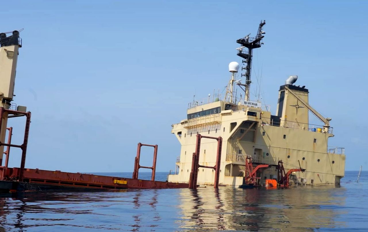 AT SEA - MARCH 3: (EDITORS NOTE: Best quality available) This handout photo provided by Yemeni Al-Joumhouria TV, shows the British-registered cargo ship 'Rubymar' sinking, after it was targeted by Yemen's Houthi forces in international waters in the Red Sea, on March 3, 2024, in the Red Sea. (Photo by Al-Joumhouriah channel via Getty Images)