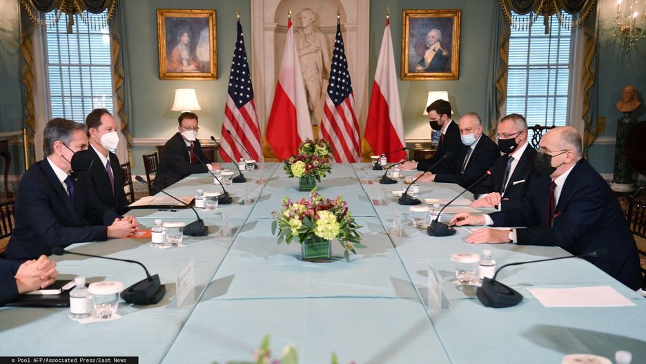 TemporarySecretary of State Antony Blinken, left, meets with Polish Foreign Minister Zbigniew Rau, right, at the State Dept., Friday, Feb. 4, 2022  in Washington. (Nicholas Kamm/Pool via AP)Pool AFP