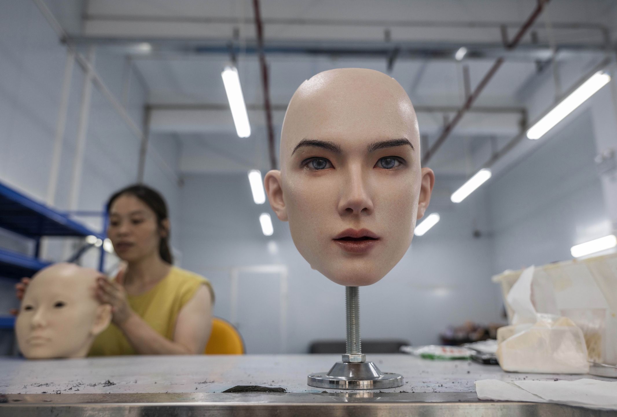 ZHONGSHAN, CHINA - JUNE 25: A robotic head for a sex doll, also known as a love doll, that can speak and move, is seen in the research and development area at a factory for WM Dolls on June 25, 2025 in Zhongshan, China. Advances in artificial intelligence and robotics are transforming the love doll industry in China, with WM Dolls, one of the biggest manufacturers, predicting a double-digit rise in sales this year. The company's next-generation companions feature silicone skin and realistic characteristics and are enhanced by open-source generative AI models that allow the fully customizable dolls to show personality traits, hold conversations, and mimic emotions. Most of the anthropomorphic products made by WM Dolls are for export with high-end models costing around $3000.  (Photo by Kevin Frayer/Getty Images)