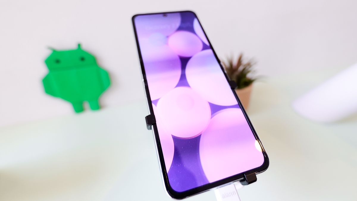 The Samsung Galaxy Z Flip5, a horizontally folding smartphone by the Korean multinational conglomerate, is being showcased with Google's AI on Android's Avenue at the Mobile World Congress 2024 in Barcelona, Spain, on March 25, 2024. (Photo by Joan Cros/NurPhoto via Getty Images)