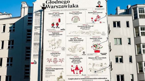 Warszawa. Mural "Kurier Głodnego Warszawiaka" to prośba o wspomaganie lokalnej gastronomii w pandemii