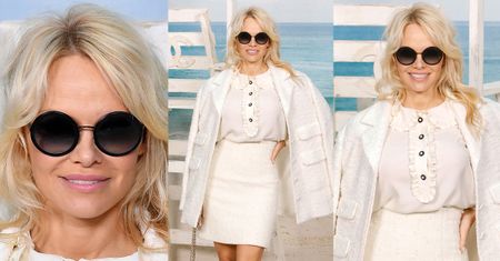 Elegancka Pamela Anderson pozdrawia fotografów na pokazie Chanel