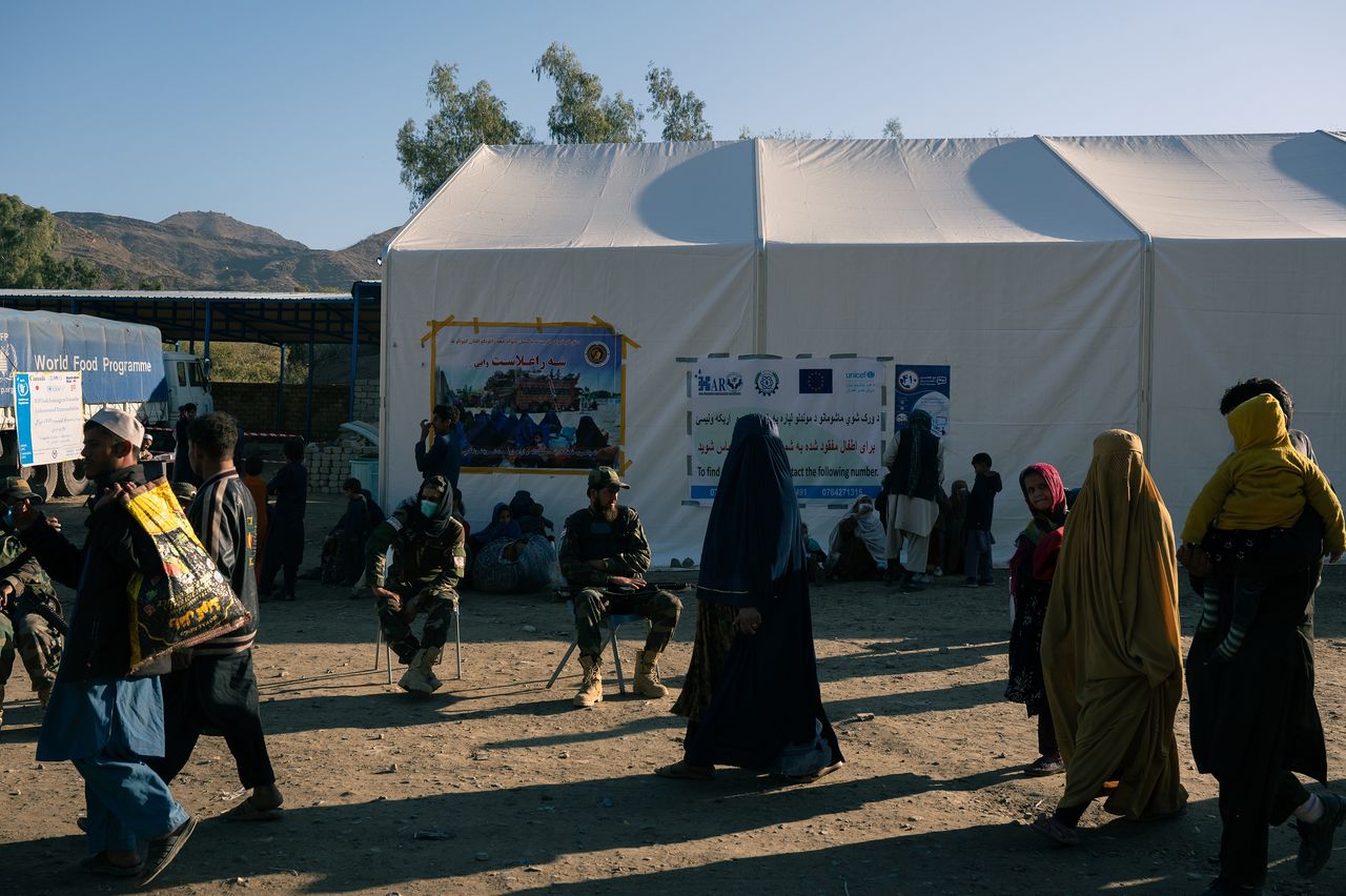 Afghans deported from Pakistan still arrive at the camp at the Afghan-Pakistani border crossing in Torkham.