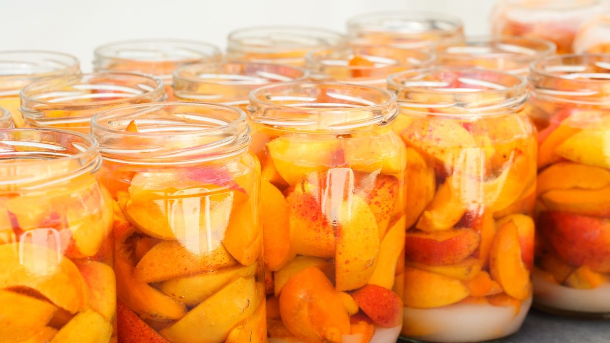 Apricot slices with water and sugar in jars. Homemade fruit compotes ready to be lidded and sterilised. Preparing winter supplies at home
Close up of apricot slices with water and sugar in jars. Homemade fruit compotes ready to be lidded and sterilised. Preparing winter supplies at home.
Miroslava  Ivanova
glass, natural, pasteurized, product, sliced, sterilized, sterilization, storage, supplies, traditional