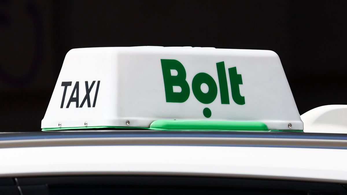 Bolt taxi sign is seen on a car in Krakow, Poland on July 18, 2022. (Photo by Jakub Porzycki/NurPhoto via Getty Images)