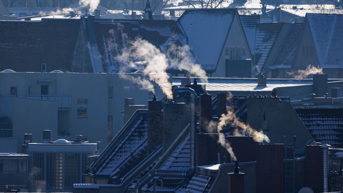 HALLE, GERMANY - DECEMBER 15: Exhaust rises from chimneys of buildings in the city center during a day of sub-zero temperatures on December 15, 2022 in Halle, Germany. Germany's Federal Network Agency, faced with a December that is likely to be the coldest in the past decade, is appealing to citizens to nevertheless save energy. Germany, historically dependent on natural gas imports from Russia that have fallen to near zero over recent months, has managed to at least partially compensate for the shortfalls with natural gas imports via pipelines from Norway, the Netherlands and Belgium. Germany's first LNG terminals, which will allow it to import natural gas by ship, are due to begin operation later this month. The Heizkraftwerk Mitte plant, operated by Vattenfall, supplies both heat and electricity to residences and offices in the Berlin city center. (Photo by Jens Schlueter/Getty Images)