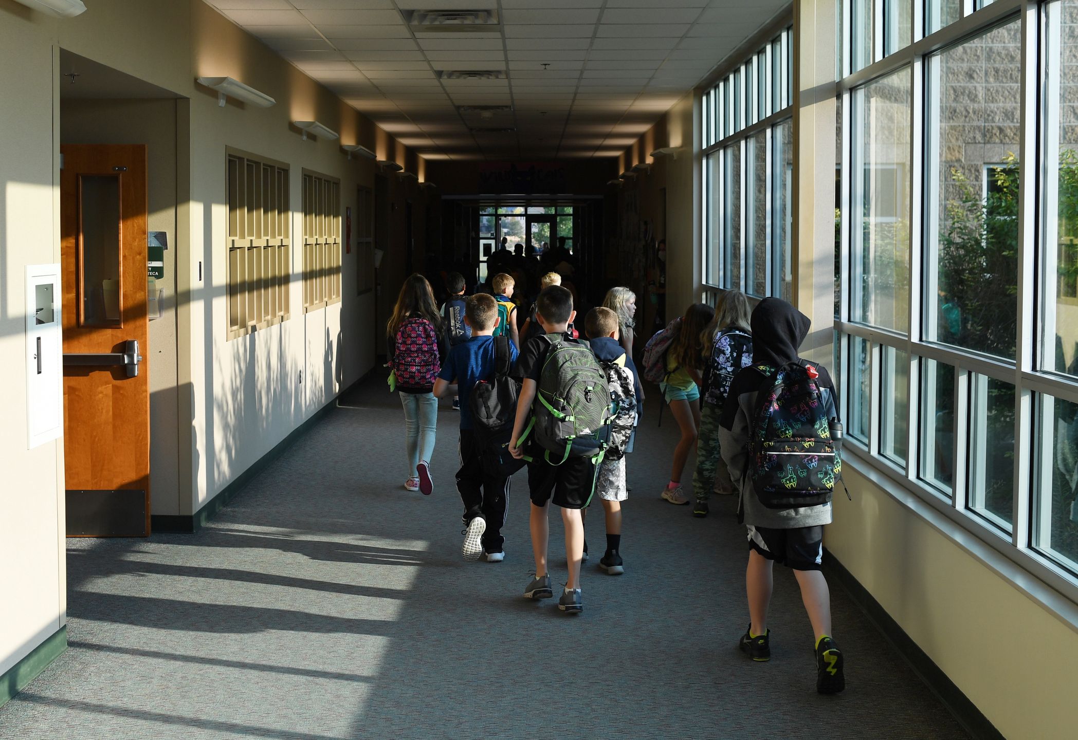 THORNTON, COLORADO - AUGUST 12: Students head to class at West Ridge Elementary, in the 27J School District, on August 12, 2021 in Thornton, Colorado. (Photo by RJ Sangosti/MediaNews Group/The Denver Post via Getty Images)