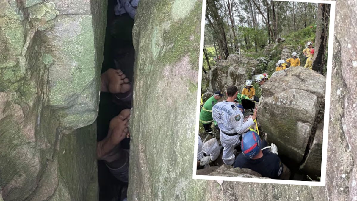Kobieta uwięziona między ogromnymi głazami.