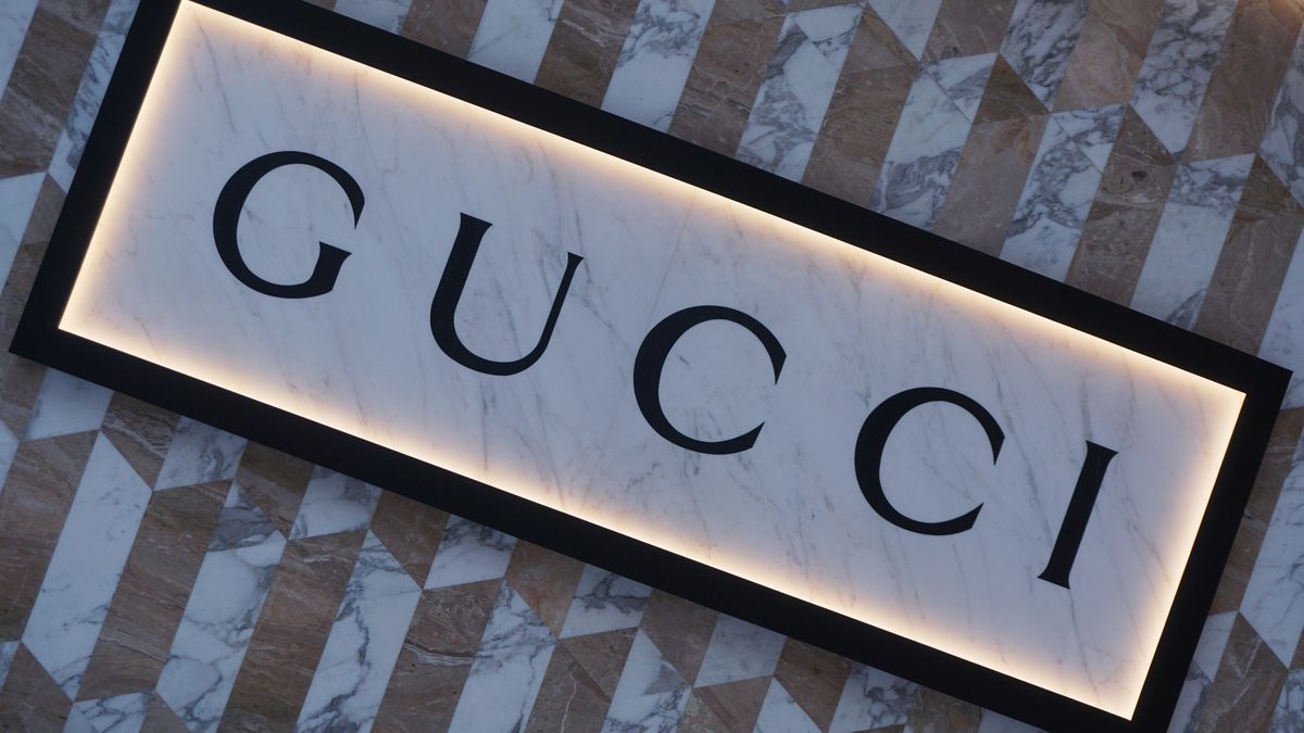 Customers walk past a GUCCI store in Hangzhou, Zhejiang Province, China, Feb. 12, 2025. (Photo credit should read CFOTO/Future Publishing via Getty Images)
