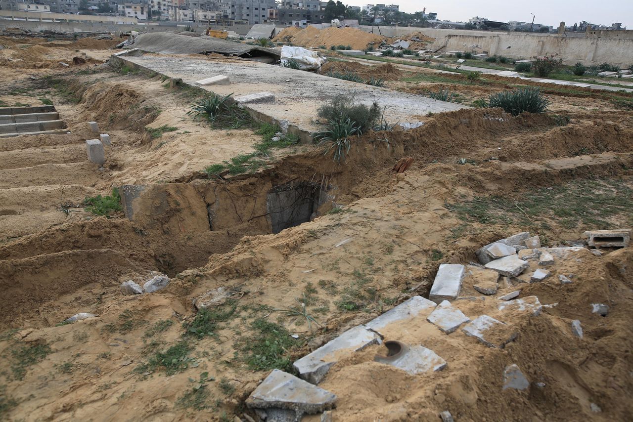 KHAN YUNIS, GAZA - JANUARY 17: A view of a damaged cemetery following the Israeli attacks near the Nasser Hospital in Khan Yunis, Gaza on January 17, 2024. (Photo by Jehad Alshrafi/Anadolu via Getty Images)