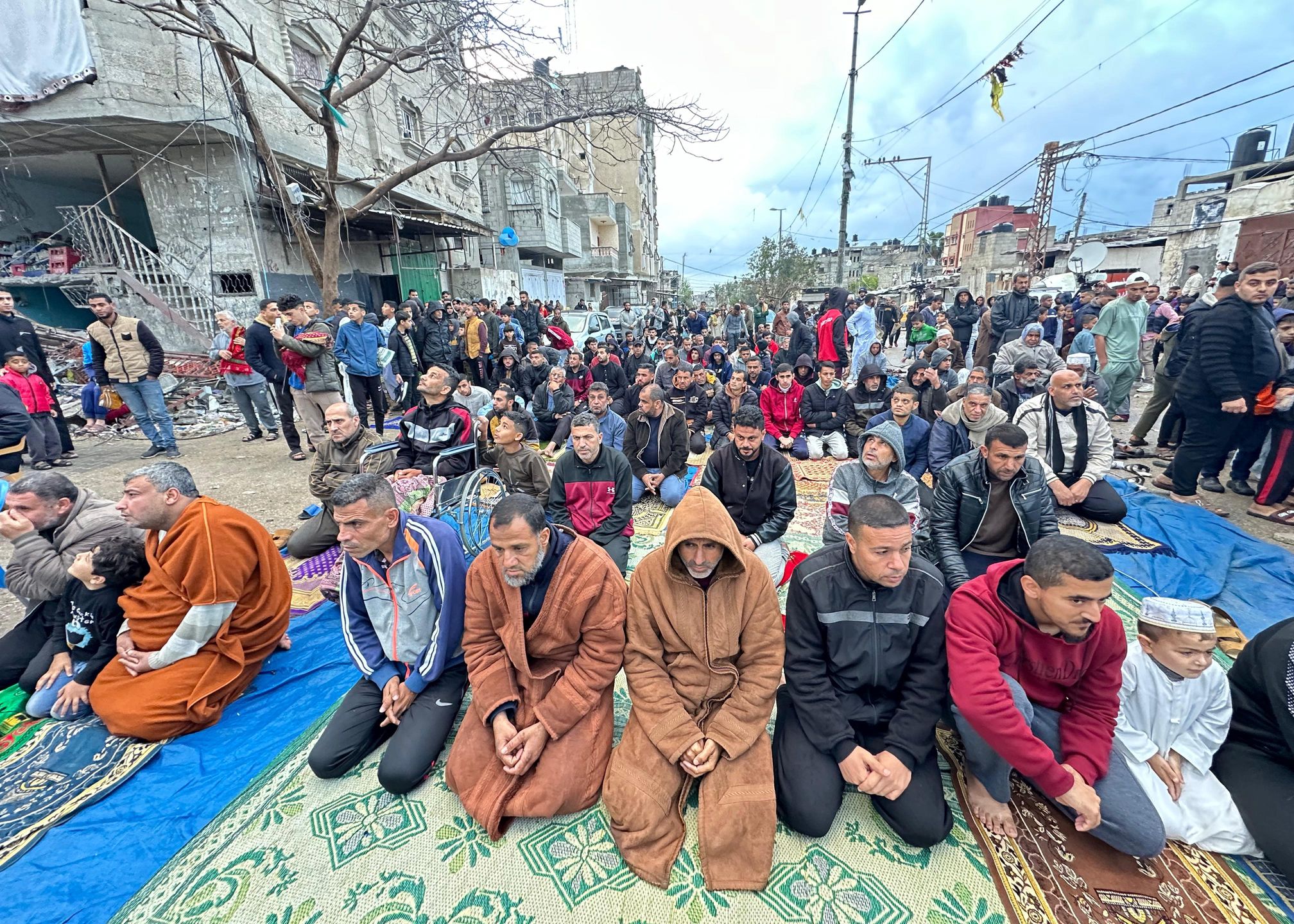 Eid al-Fitr prayer in Gaza's RafahRAFAH, GAZA - APRIL 10: Muslims perform Eid al-Fitr prayer at the tents and the street set up next to the rubble of the al-Farouk Mosque, which was destroyed by Israeli attacks in Rafah, Gaza on April 10, 2024. (Photo by Doaa Albaz/Anadolu via Getty Images)Anadoluamid war, eid al-fitr, eid al-fitr prayer, gaza, muslims, worship