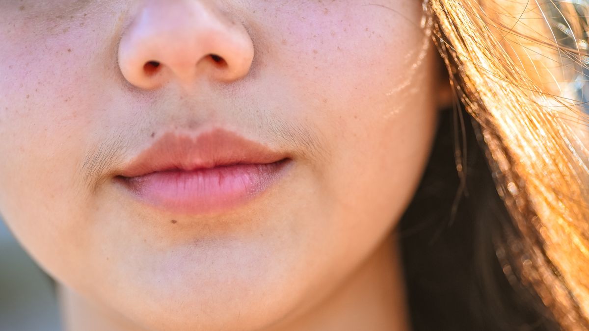 Facial hair on woman mouth and lips
Young woman with beautiful lips and clear skin has some upper lip facial hair. Despite traditional beauty standards, she is a true natural beauty
Lisa5201
