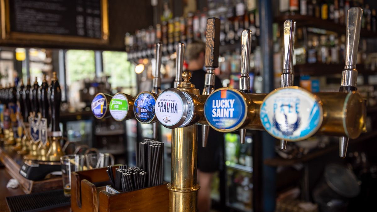 Draught beer on tap at a bar of the East Dulwich Tavern pub in south London, UK on Saturday, Sept. 3, 2022. The government has been criticized for waiting until the election of a new Conservative leader before announcing new policies to help families and businesses survive an exceptional rise in global energy prices. Photographer: Betty Laura Zapata/Bloomberg via Getty Images