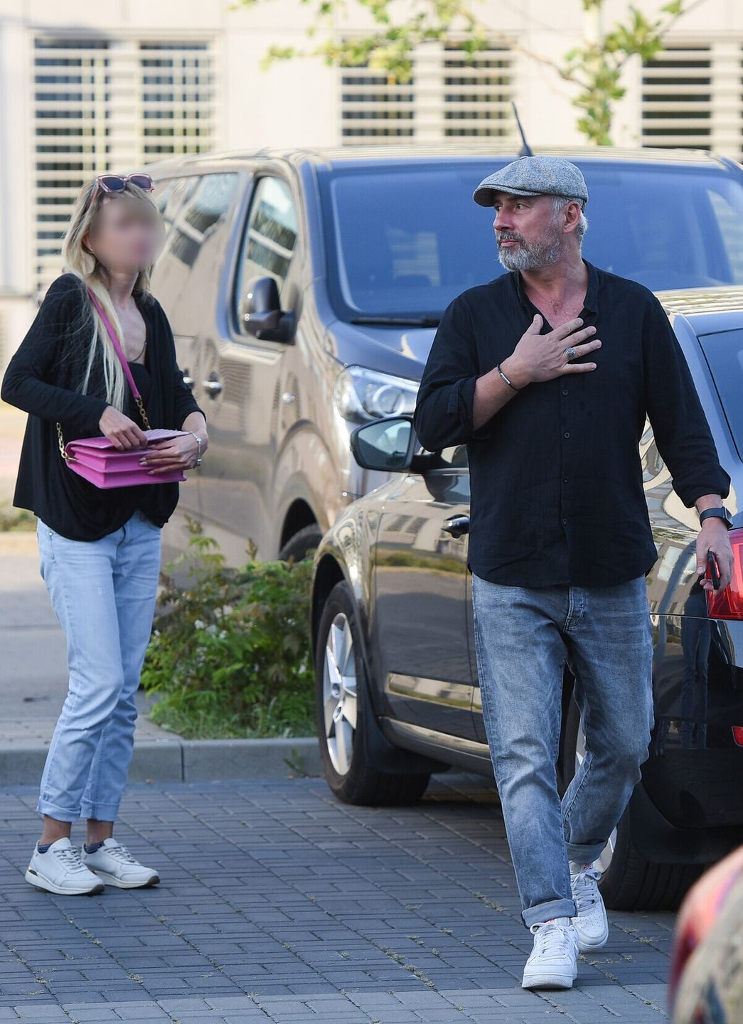 Jacek Kopczyński przybył na premierę z nową partnerką