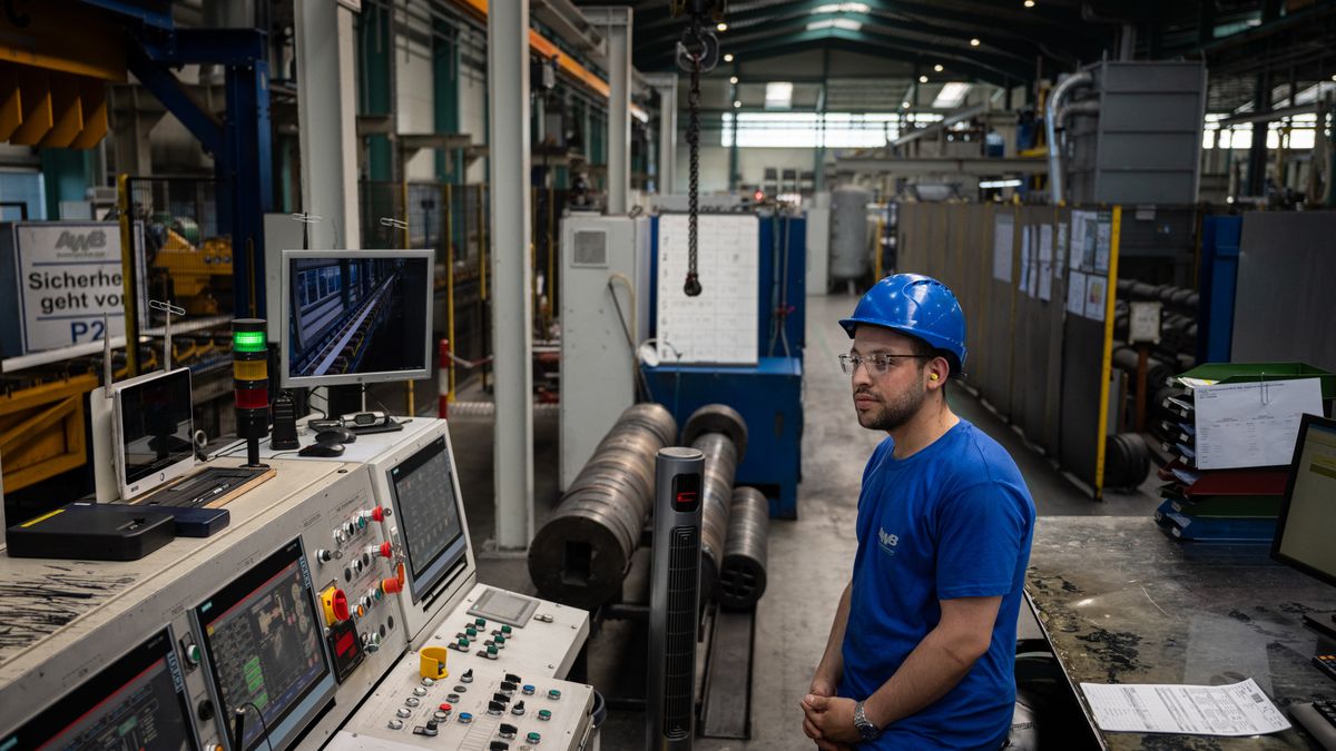 BERLIN, GERMANY - AUGUST 27: An employee works at the AWB Aluminiumwerk Berlin GmbH aluminum parts manufacturer, which employs Germans and foreign workers, some of whom are refugees, on August 27, 2024 in Berlin, Germany. Germany is facing an acute nationwide shortage of skilled labor. (Photo by Tamir Kalifa/Getty Images)