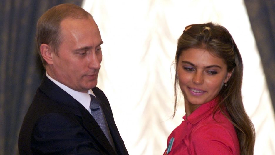 Putin
Russian President Vladimir Putin, left, hands over a state award to olympic games and world champinships winner, rhytmic gymnast Alina Kabaeva. (Polaris)