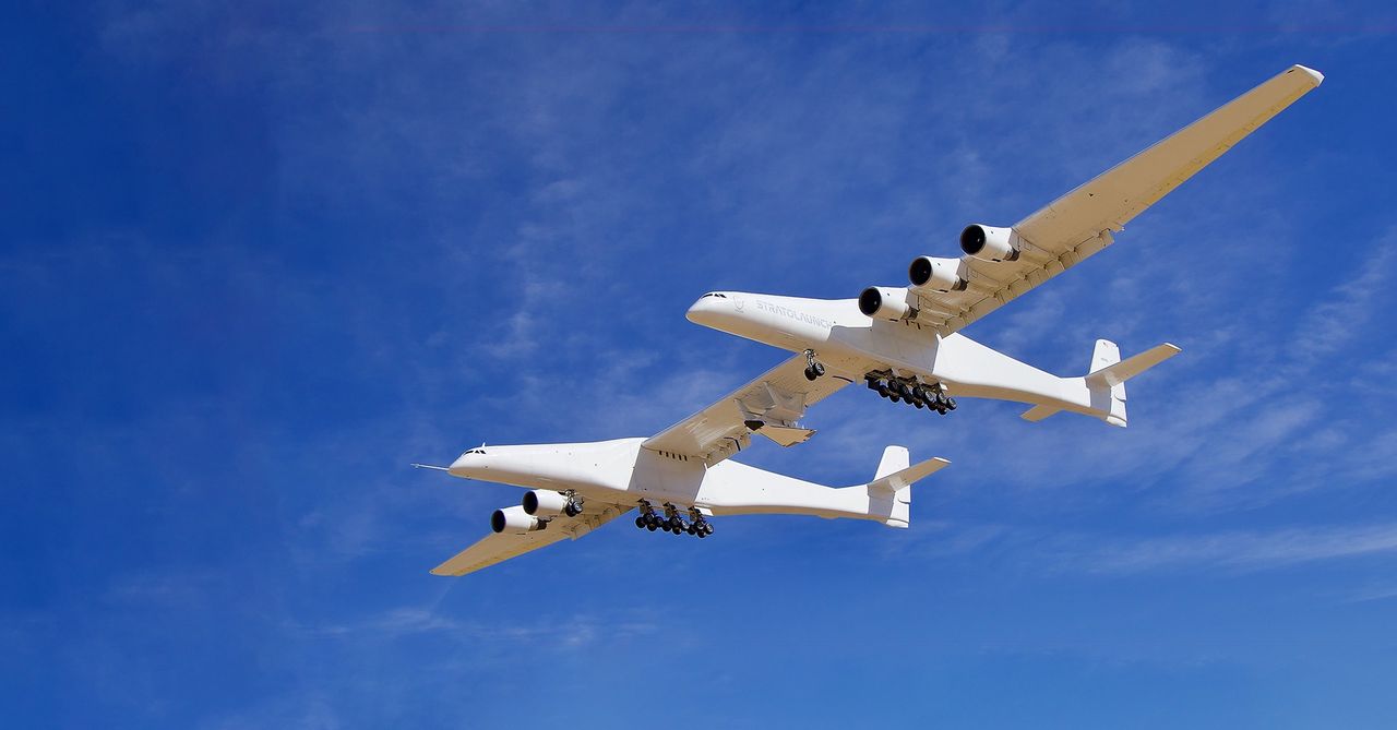 Talon-A under the centre wing of the Stratolaunch Model 351 aircraft