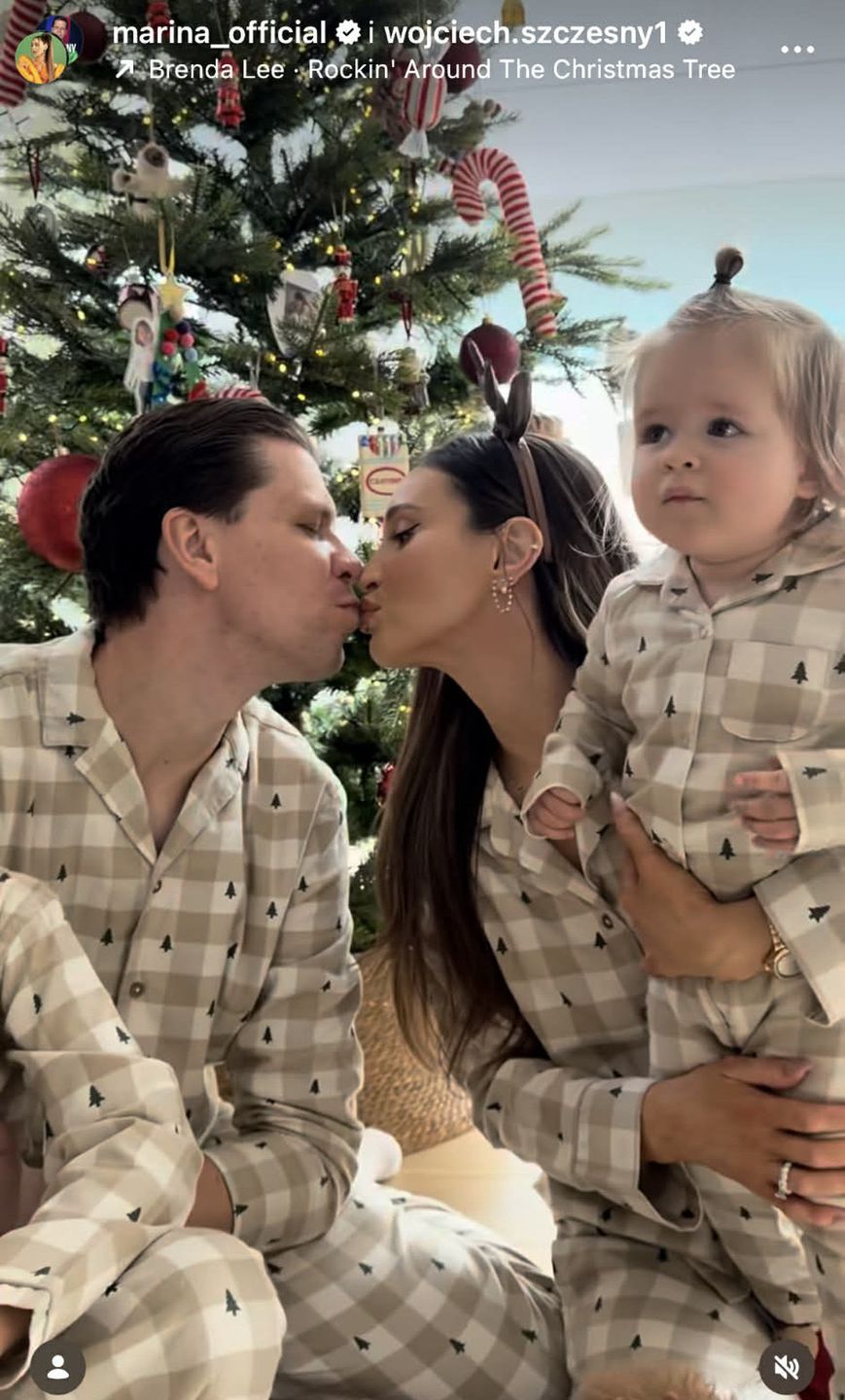 Marina Łuczenko i Wojciech Szczęsny z dziećmi