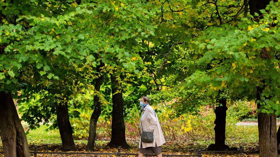 GDANSK, POLAND - 2020/10/22: An elderly woman wearing a protective masks is seen Oliwski Park in Gdansk. (Photo by Mateusz Slodkowski/SOPA Images/LightRocket via Getty Images)