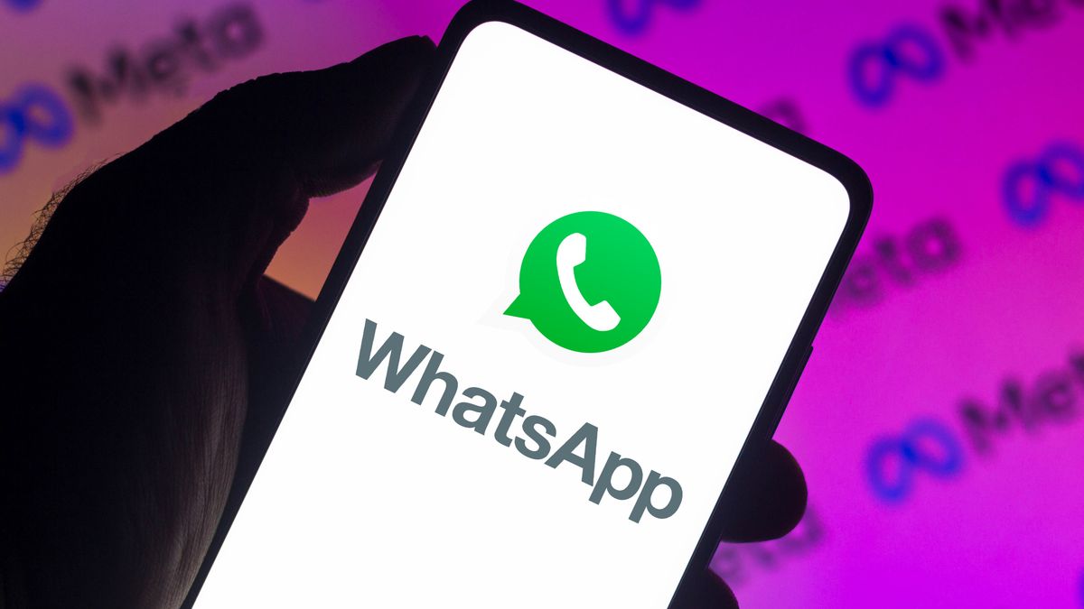 BRAZIL - 2021/12/13: In this photo illustration a WhatsApp logo seen displayed on a smartphone with a Meta Platforms logo in the background. (Photo Illustration by Rafael Henrique/SOPA Images/LightRocket via Getty Images)