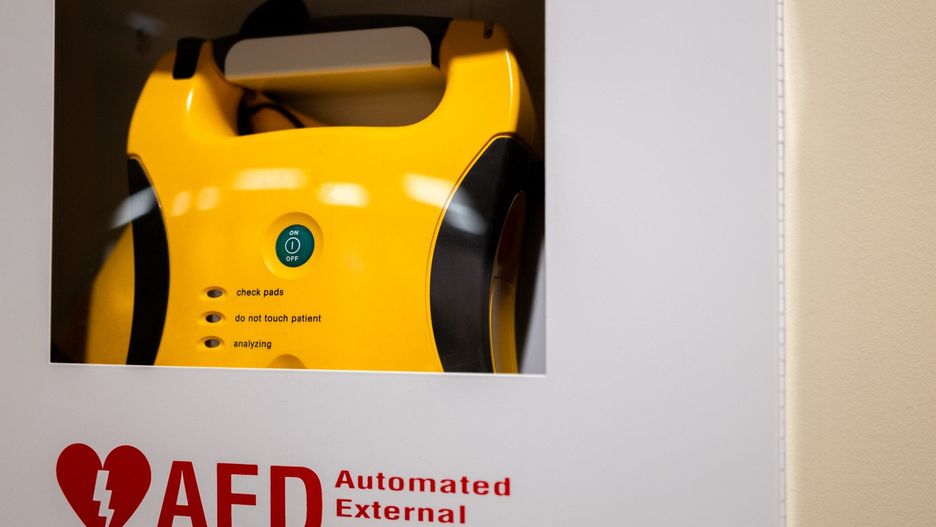 wall-mounted automated external defibrillator â€œAEDâ€ (side view)