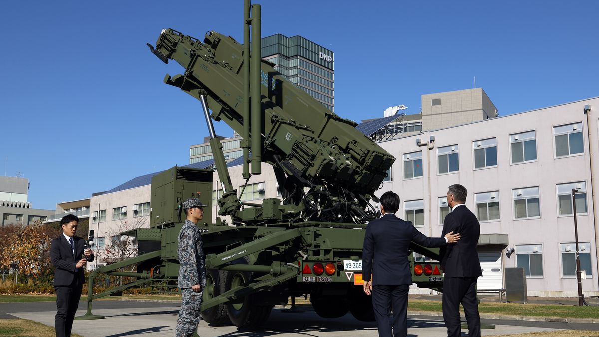 TOKYO, JAPAN - DECEMBER 7: (----EDITORIAL USE ONLY - MANDATORY CREDIT - 'FRANCK ROBICHON/POOL' - NO MARKETING NO ADVERTISING CAMPAIGNS - DISTRIBUTED AS A SERVICE TO CLIENTS----) Japanese Defense Minister Shinjiro Koizumi (2-R) invites his Australian counterpart Richard Marles (R) to walk after they inspected a Patriot Advanced Capability-3 (PAC-3) missile interceptor unit deployed at the Defense Ministry in Tokyo, Japan, 07 December 2025. Both countries Defense Ministers met in Tokyo amid tensions with China in the region. (Photo by Franck Robichon/Pool/Anadolu via Getty Images)