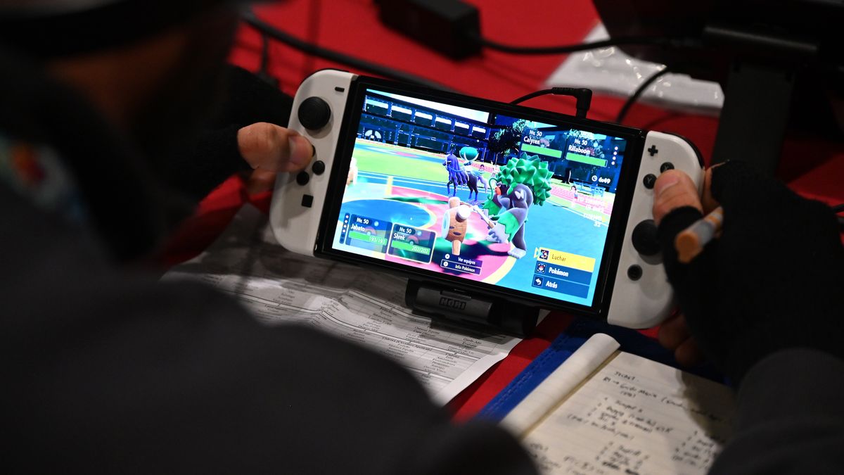 LONDON, ENGLAND - FEBRUARY 21: Competitors play Pokemon Scarlet and Violet on Nintendo Switch consoles during the Pokémon European International Championship 2025 at ExCel London on February 21, 2025 in London, England. Players are playing for Championship Points that will determine who will earn an invitation to the 2025 World Championships in Anaheim, California, in August. (Photo by John Keeble/Getty Images)