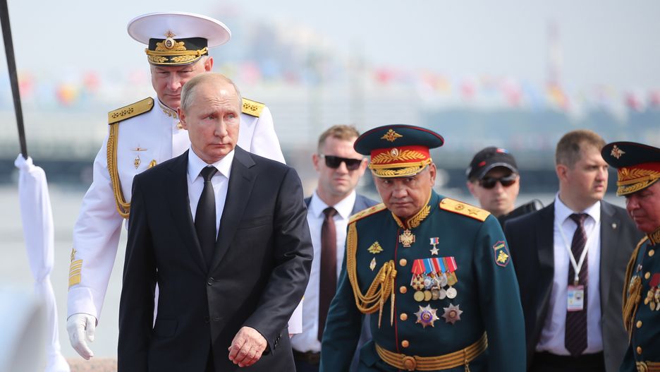 Putin Displays Military Might On Russia Navy Day
Nikolai Yevmenov, commander-in-chief of the Russian Navy, left, Vladimir Putin, Russia's president, center, and Sergei Shoigu, Russia's defense minister, third right, attend the Russian Navy day in St. Petersburg, Russia, on Sunday, July 28, 2019. Putin observed a large naval parade in Russias second city of St. Petersburg Sunday, a day after a harsh police crackdown on peaceful protesters in the capital. Photographer: Andrey Rudakov/Bloomberg via Getty Images
Bloomberg
Defense, EAME, EMEA, Politics, Russia