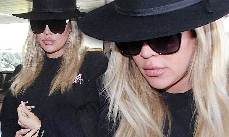 Ciężarna Khloe Kardashian przebrana za Zorro cichaczem przemyka się przez lotnisko! Jej brzuch był w centrum uwagi