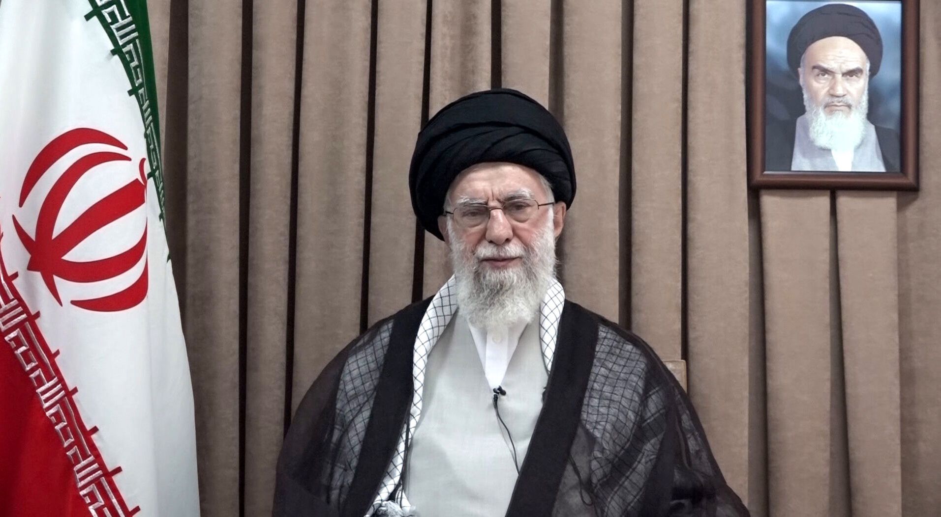 TEHRAN, IRAN - JUNE 18: (----EDITORIAL USE ONLY - MANDATORY CREDIT - 'OFFICE OF THE SUPREME LEADER OF IRAN / HANDOUT' - NO MARKETING NO ADVERTISING CAMPAIGNS - DISTRIBUTED AS A SERVICE TO CLIENTS----) Iranian Supreme Leader Ali Khamenei addresses the nation on Iranian state television broadcast in Tehran, Iran on June 18, 2025. In a televised address, Khamenei commented on the recent tensions and threats. (Photo by Office of the Supreme Leader of Iran / Handout /Anadolu via Getty Images)