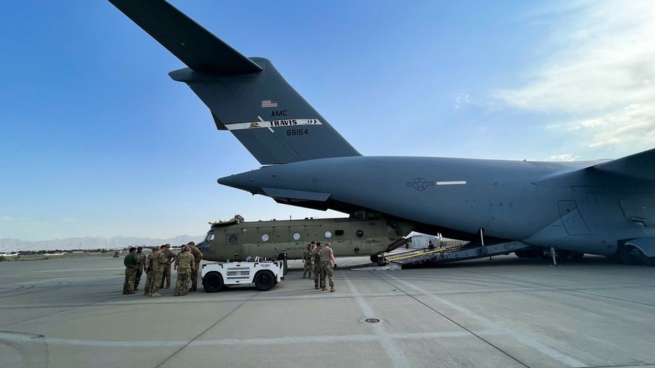 Temporary(210830) -- WASHINGTON, Aug. 30, 2021 (Xinhua) -- A CH-47 Chinook is loaded onto a U.S. Air Force C-17 Globemaster III at Hamid Karzai International Airport in Kabul, Afghanistan, on Aug. 28, 2021. The U.S. Central Command announced Monday that the withdrawal of U.S. troops from Afghanistan has completed, ending 20 years of U.S.-led invasion into the country. (U.S. Central Command Public Affairs/Handout via Xinhua)U.S. Central Command Public Affairs