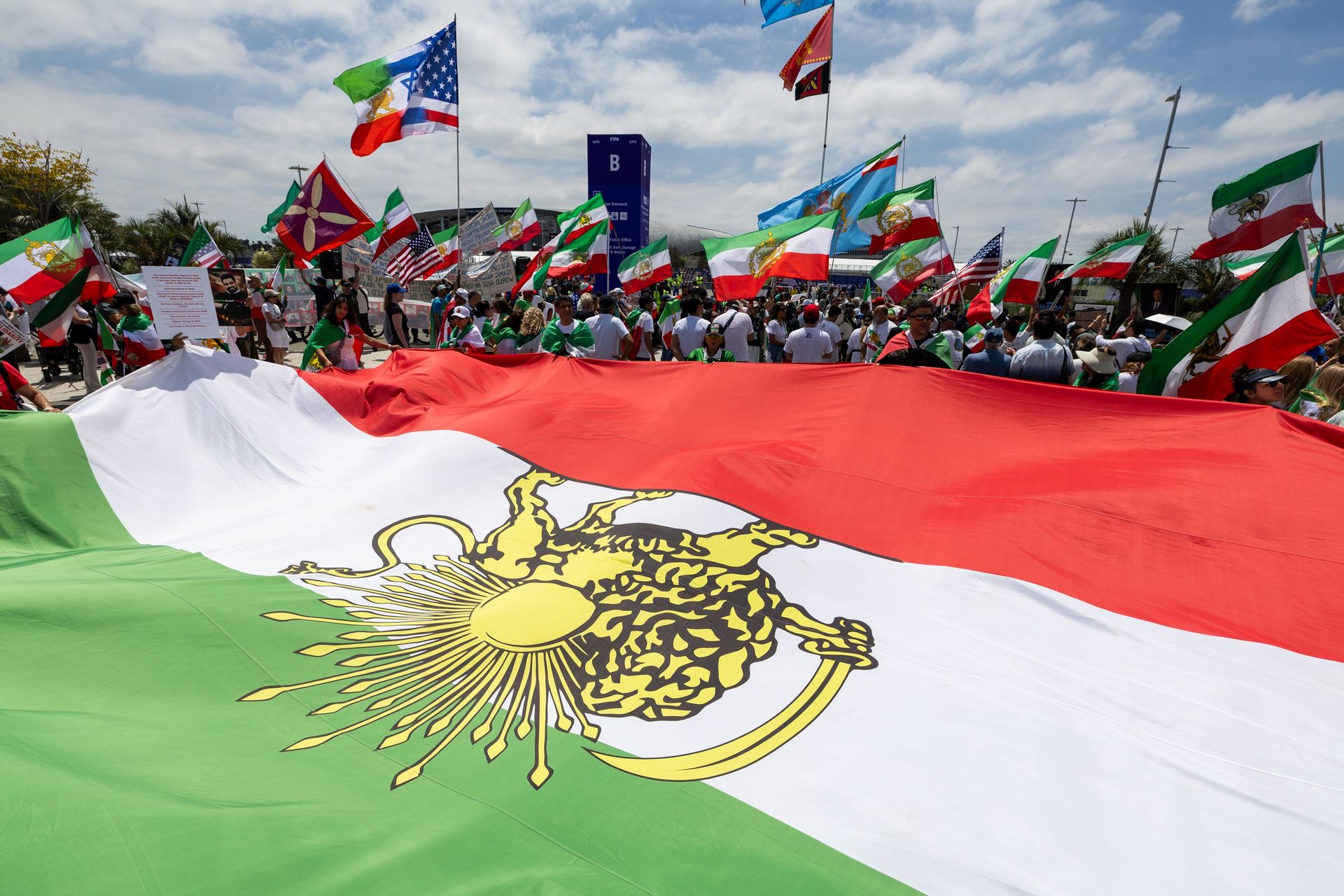 Iran fans defy FIFA ban, wave pre-revolution lion flag at Belgium match in LA