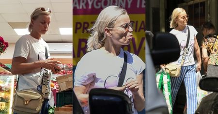 Naturalna Małgorzata Foremniak w spodniach od piżamy (?) człapie do auta z naręczami papieru toaletowego (ZDJĘCIA)